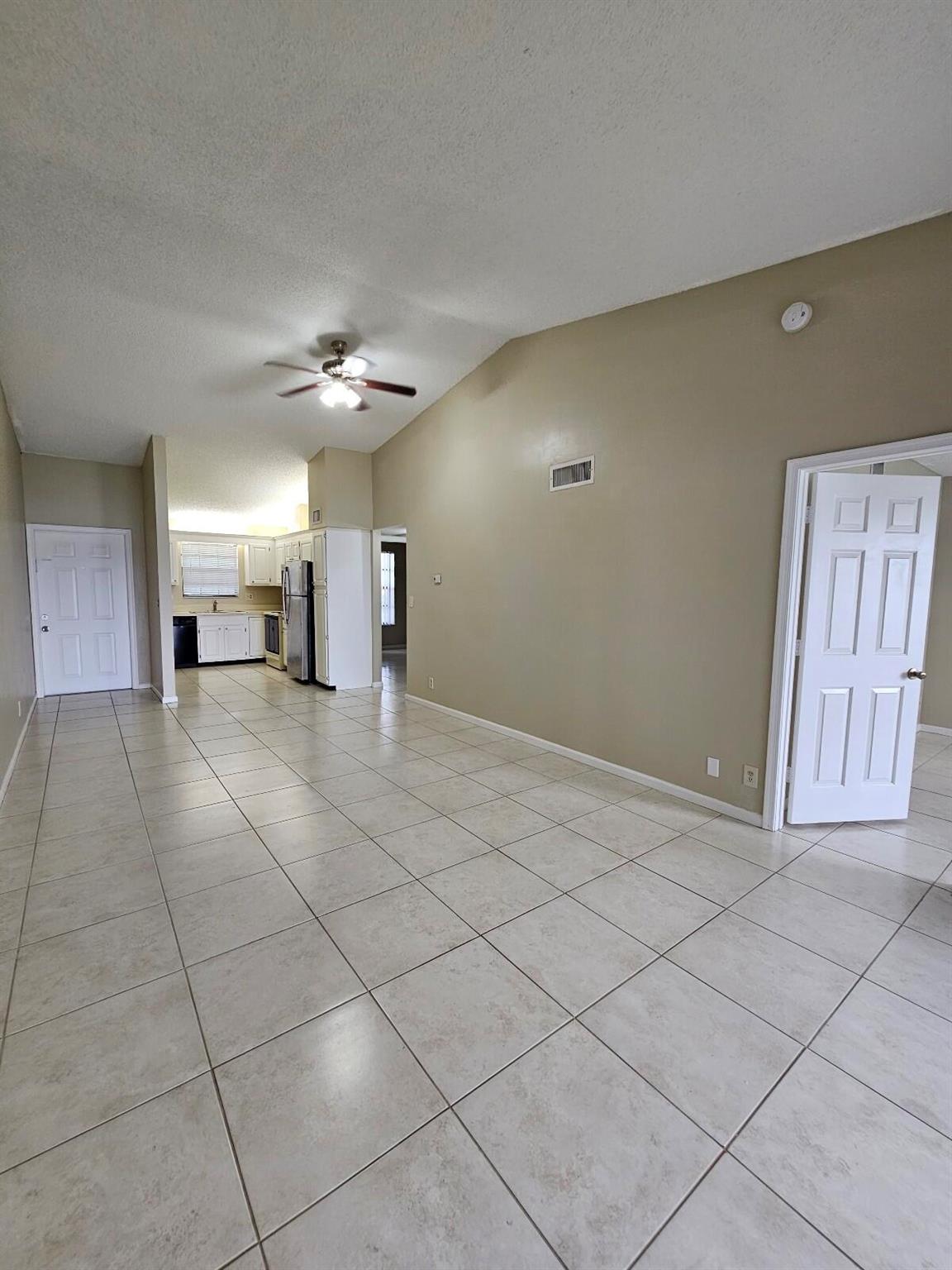 FRESHLY PAINTED 2 BEDROOM 2 BATHROOM AMAZING LAKE VIEW UNIT WITH VAULTED CEILINGS- ALL TILE FLOORS THROUGHOUT THE UNIT. SECOND FLOOR WITH LOTS OF SUNLIGHT. 24 HOUR SECURITY PATROL WITH 24 HR MANNED GATE. WINDWOOD IS A PRIVATE, SELF CONTAINED COMMUNITY IN THE HEART OF EAST BOCA RATON. ALL AGES WELCOME. THE COMMUNITY SURROUNDS A BEAUTIFUL 20 ACRE LAKE! WINDWOOD IS JUST MINUTES FROM THE BEACH. EAST OF I-95. EASY TO RENT OUT, CLOSE TO FLORIDA ATLANTIC UNIVERSITY. . AMENITIES INCLUDE 2 CLUBHOUSES, 2 SWIMMING POOLS, 3 TENNIS COURTS OUTDOOR RACQUETBALL COURTS AND PICNIC AREAS, FISHING, BIKE PATHS AND JOGGING PATHS AROUND THE 20 ACRE LAKE ALL IN THE HEART OF EAST BOCA RATON.