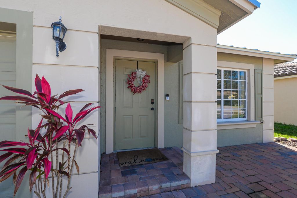 Photo of 2000 SW Marblehead Way, Port Saint Lucie, FL 34953 (MLS # R10952719)