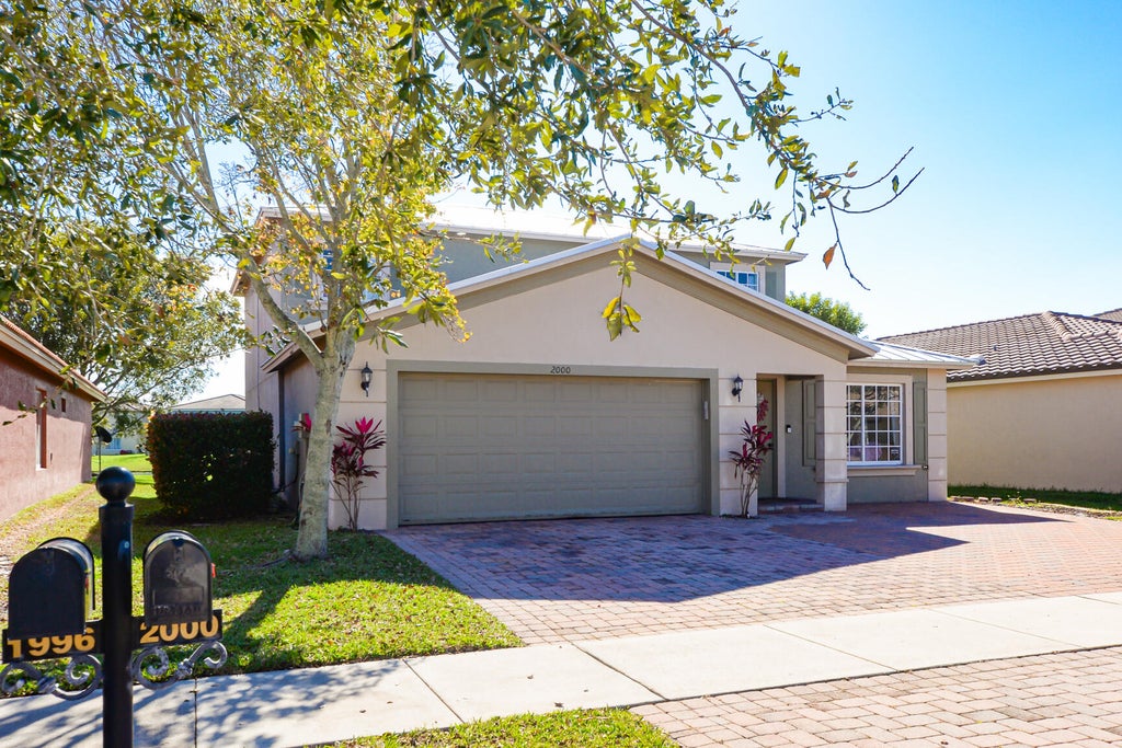 Photo of 2000 SW Marblehead Way, Port Saint Lucie, FL 34953 (MLS # R10952719)