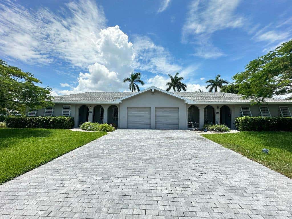 Photo of 6401 NE 7th Avenue, Boca Raton, FL 33487 (MLS # R11105692)