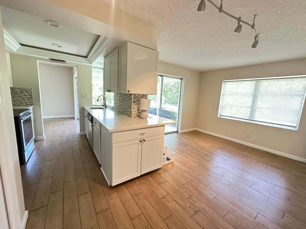 Photo of 6401 NE 7th Avenue, Boca Raton, FL 33487 (MLS # R11105692)