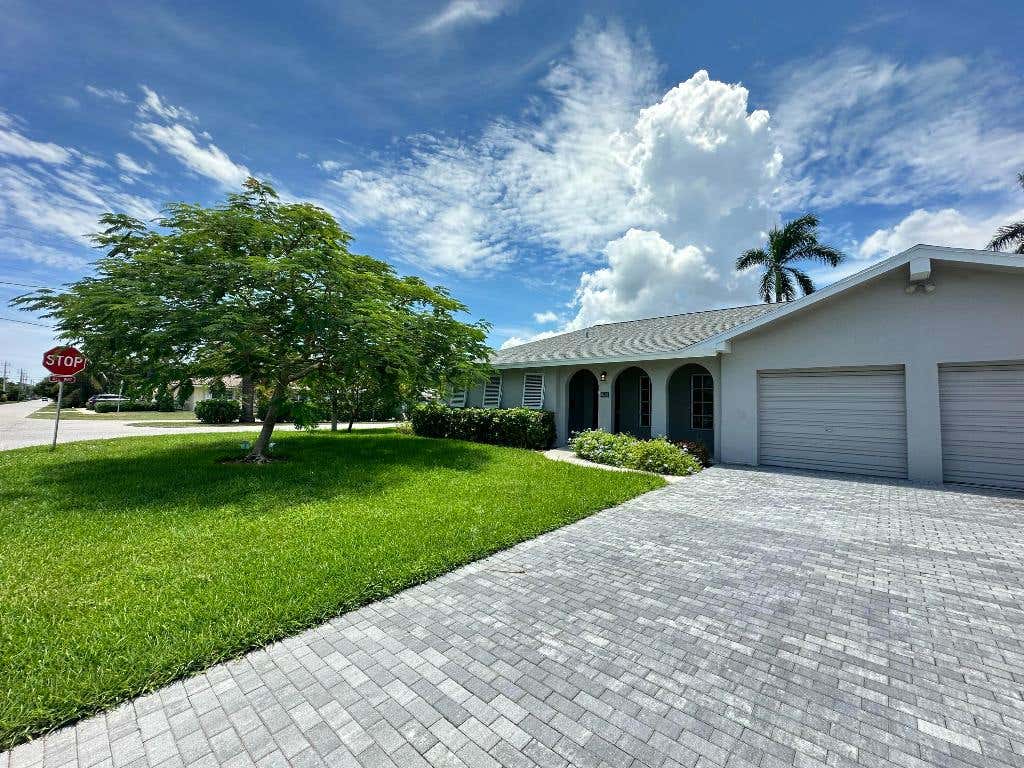 Photo of 6401 NE 7th Avenue, Boca Raton, FL 33487 (MLS # R11105692)