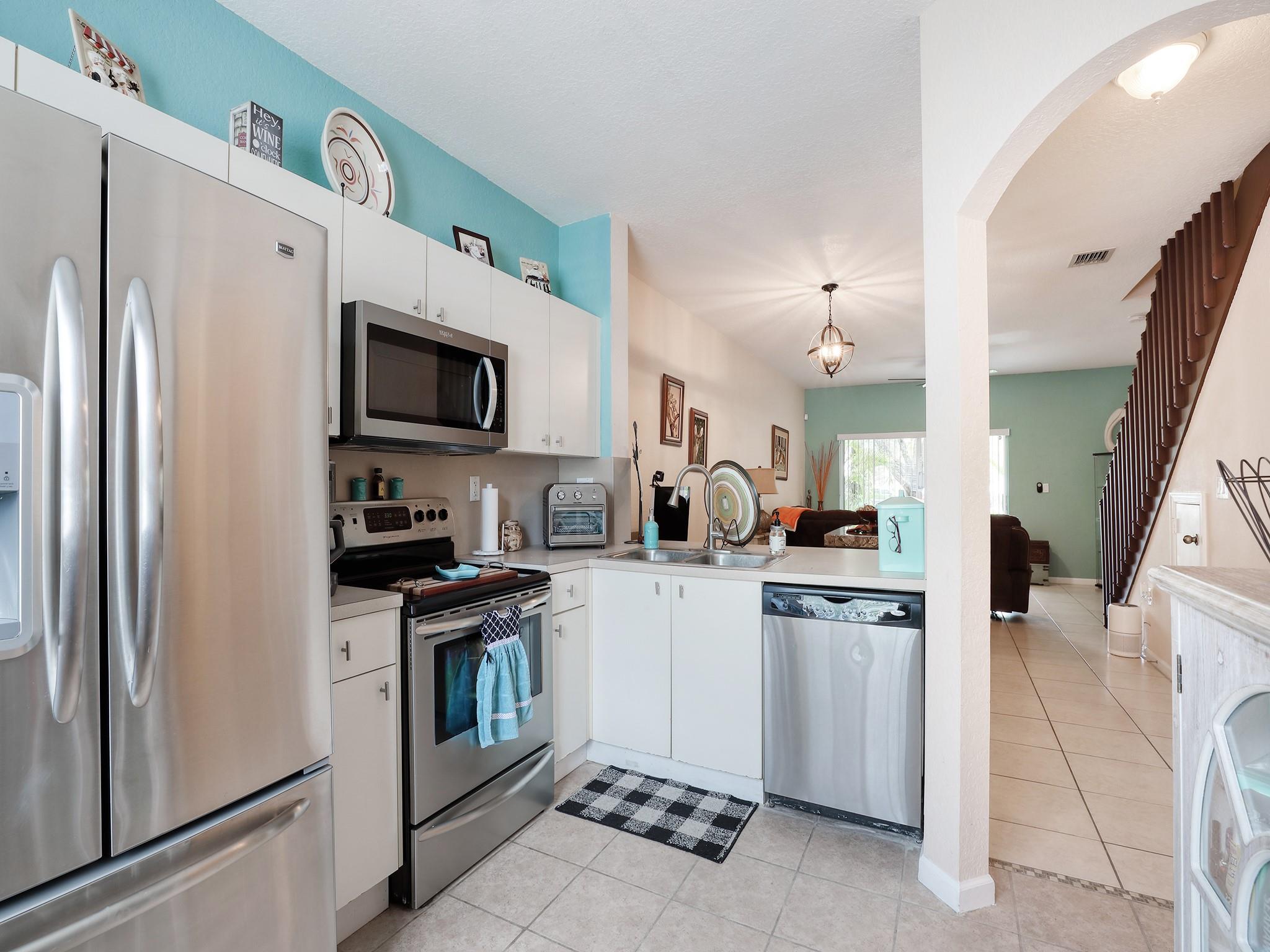 FHA approved! Welcome home to this elegant, garden view two-bedroom, two-and-a-half-bath townhouse in the sought-after Tuscany community. The kitchen has all stainless steel appliances which includes a Maytag French double door refrigerator. New Maytag washer and dryer and new AC is a plus!. Sit outside and relax on your patio. Close to all shopping areas and major highways. Low HOA