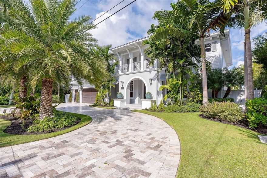 Spectacular Custom Built Home!  First time on the market.  Experience luxury at its finest in this British West Indies style Las Olas home.  Tropical curb appeal greets you at the door, as you enter this beautiful home you will notice its warm feel.  There are high ceilings with amazing details.  There is a private office and study off the foyer.  The living room, dining area, gourmet kitchen and panty, are perfect for family and entertaining.  All with wide views of the pool area and the waterfront.  Enjoy having a drink or glass of wine in the cozy wine bar, featuring exotic doors from India to let you know you are in for a something special.  The Master Bedroom is downstairs and has a gas fire place, and a crows nest with changing mood lighting. 100 feet deep water!  Pool and spa. Balcony front and back, boat lift, three car garage, huge pantry, out door fire pits, pool, spa, living wall with fountain, top of the line appliances, utility room complete with wrapping station, two dishwashers, two sinks in the kitchen, gas range, oven, steam oven , warming oven, convection oven, microwave oven, gazebo, boat lift, 100 foot dock, metal roof, elevator, security system, Crestron Smart House technology, movie theater/media room and so much more.  This house exemplifies the perfect South Florida Lifestyle.