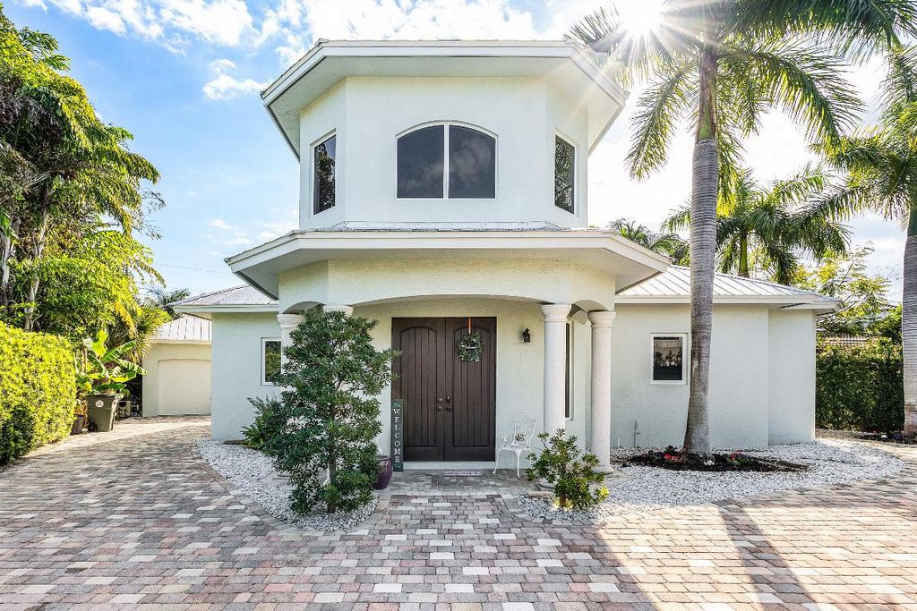 Photo of 1500 NE 4th Court, Boca Raton, FL 33432 (MLS # R11141555)