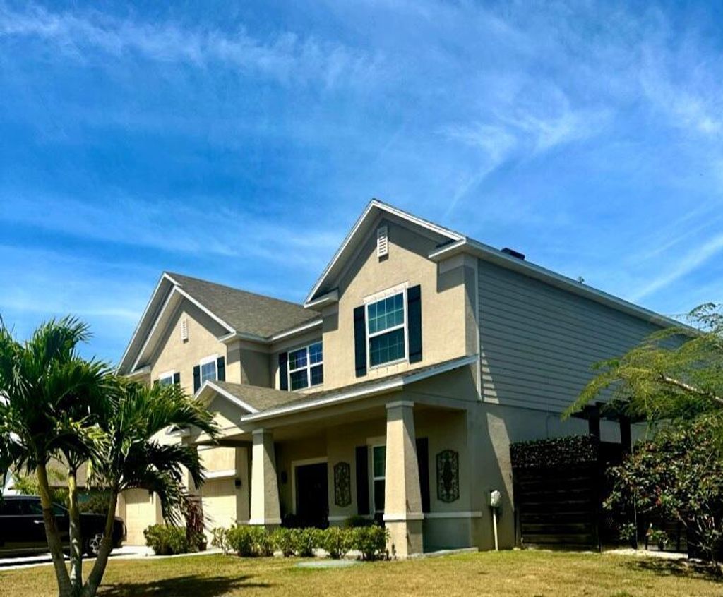 Photo of 901 SW Kappa Avenue, Port Saint Lucie, FL 34953 (MLS # R10975084)