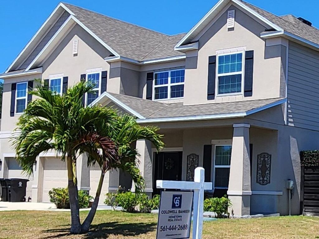 Photo of 901 SW Kappa Avenue, Port Saint Lucie, FL 34953 (MLS # R10975084)