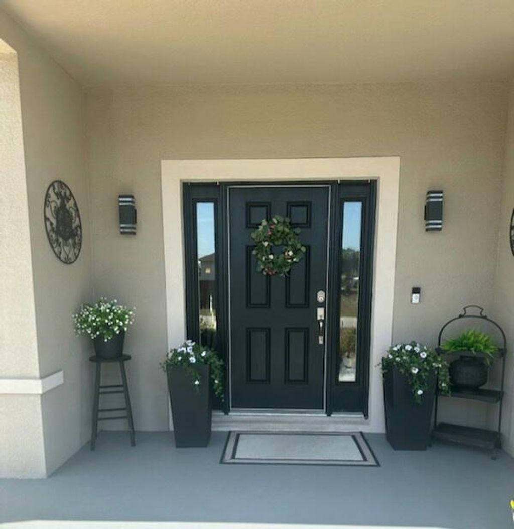 Photo of 901 SW Kappa Avenue, Port Saint Lucie, FL 34953 (MLS # R10975084)