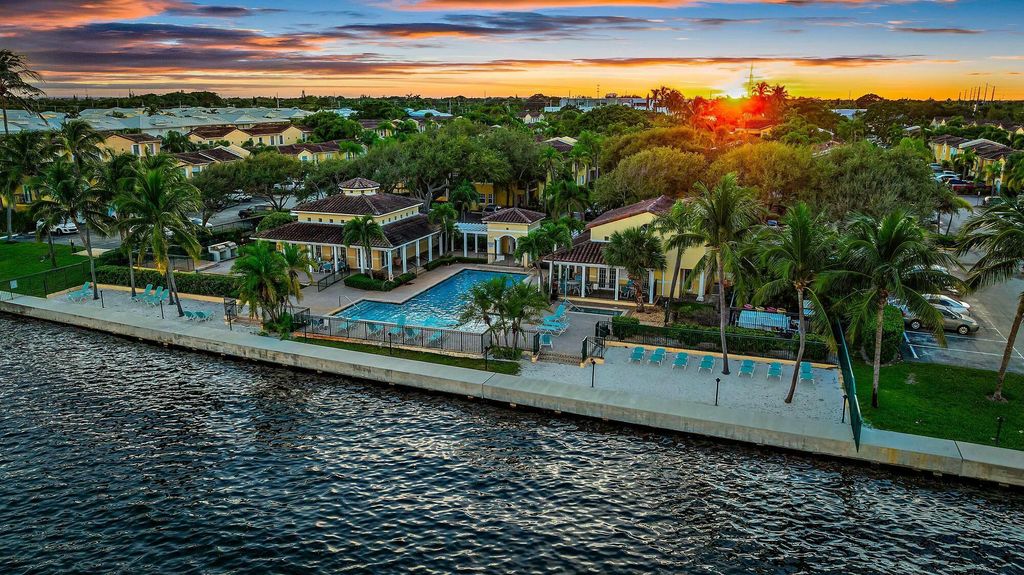 Photo of 1045 Lake Shore Drive #104, Lake Park, FL 33403 (MLS # R11043597)