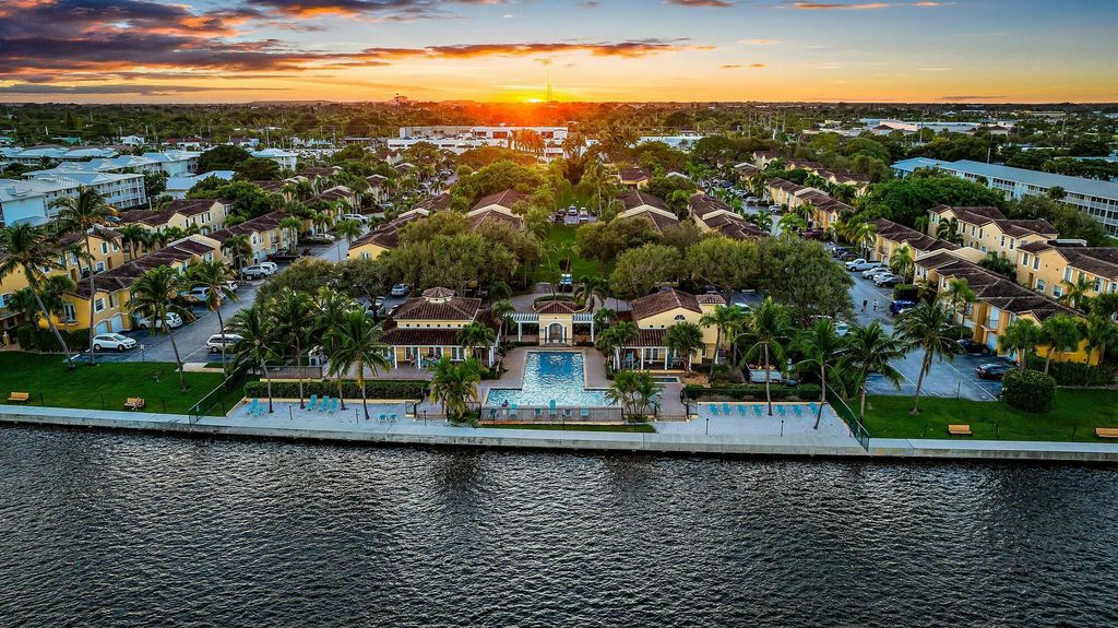 Photo of 1045 Lake Shore Drive #104, Lake Park, FL 33403 (MLS # R11043597)
