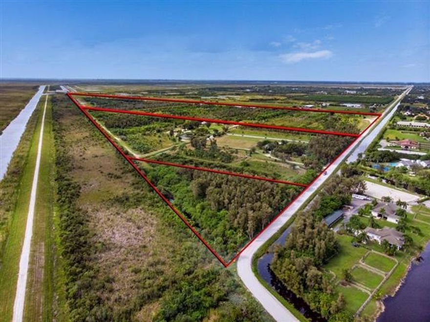 One of the last large parcels of land available in Wellington. 150 acres with private airstrip. Approved density is 1 unit per 5 acres. AG-RES. Currently used as a nursery.
Rare Opportunity. This is a must See!!