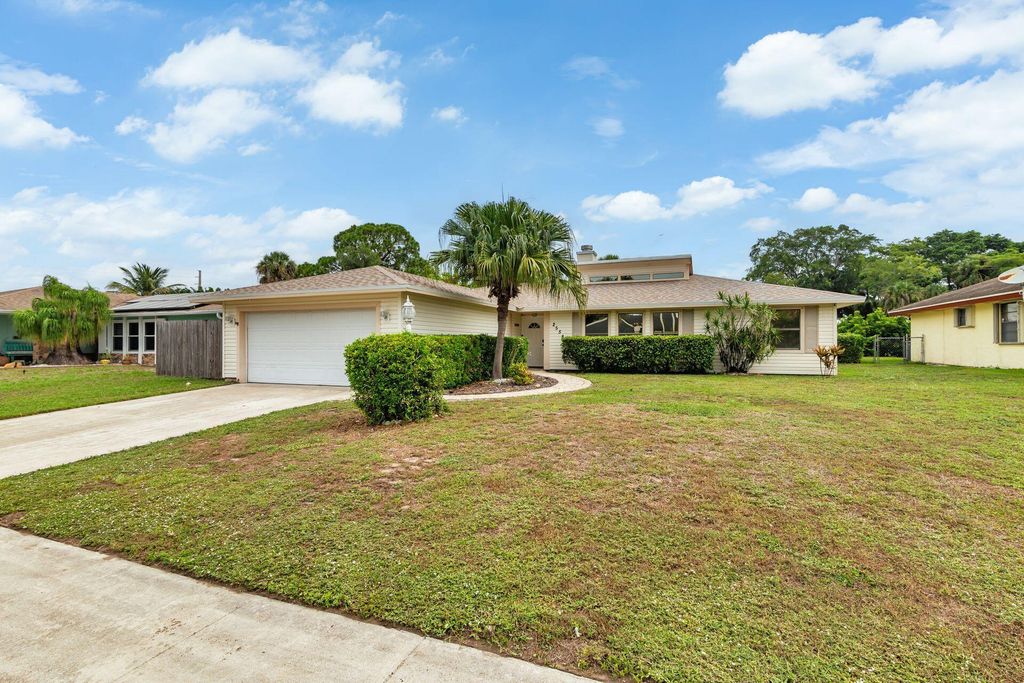 Photo of 2558 Canterbury Drive S, Riviera Beach, FL 33407 (MLS # R11096807)