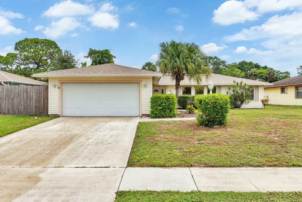 Photo of 2558 Canterbury Drive S, Riviera Beach, FL 33407 (MLS # R11096807)