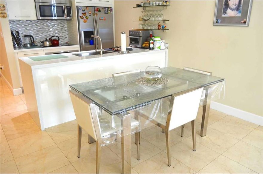 This upper penthouse at the oceanfront Beach Club building offers magnificent views of the intracoastal & city. Sit out on your balcony and marvel at the stunning sunsets. This apartment has a completely renovated kitchen and bathroom, automated shades, new washer & dryer and a/c. The den has been modified and enlarged. Can be offered furnished or unfurnished. Rent includes internet, basic cable, hot water, 1 assigned parking and free valet for the 2nd car. Enjoy the luxurious Beach Club amenities. 50k sq. ft. two story Health Club, infinity pools, sun decks, pool side restaurant, beach access and more. Available Dec 14, 2020.