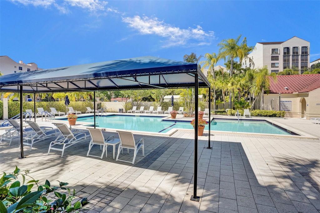 Photo of 7568 Regency Lake Drive #701, Boca Raton, FL 33433 (MLS # F10451020)