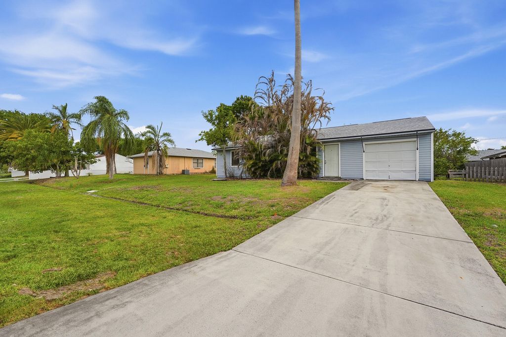 Photo of 1809 SW Morelia Lane, Port Saint Lucie, FL 34953 (MLS # B26006171)