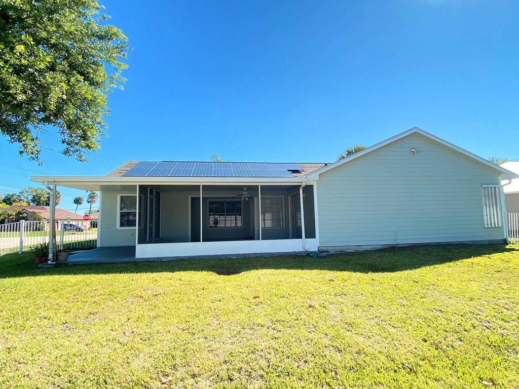 Photo of 2242 SW Natema Road, Port Saint Lucie, FL 34953 (MLS # B26005980)