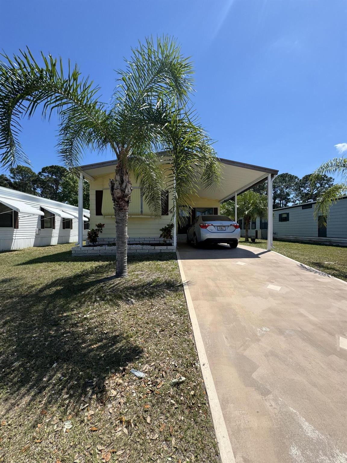 SELLER WANTING A QUICK SALE! BRING OFFER! Being sold AS-IS. 2 Bedroom 2 Bath. Split floor plan. Has screened in patio. Private backyard, no one behind you and backs up to wooded area. There is no information known on roof age, or A/C age. HOME IS A FIXER UPPER. 55+community. Private golf course (no fees) 2 pools, Tennis, Pickleball, shuffleboard, Bocce, and many events year round & so much more!! Trash pickup and grass cutting too.