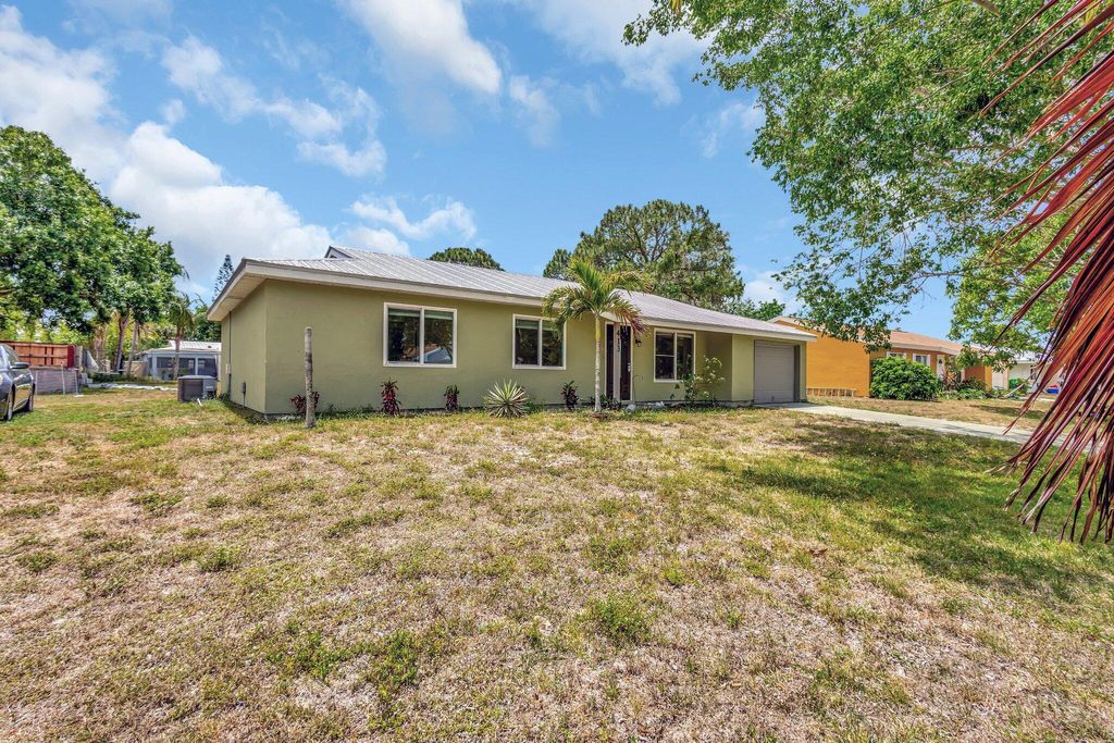 Photo of 413 SW Kentwood Road, Port Saint Lucie, FL 34953 (MLS # R11087743)