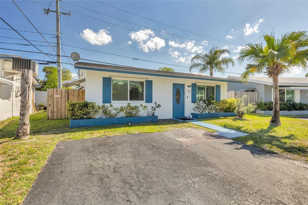 Photo of 1906 NW 45th Court, Tamarac, FL 33309 (MLS # B26040238)