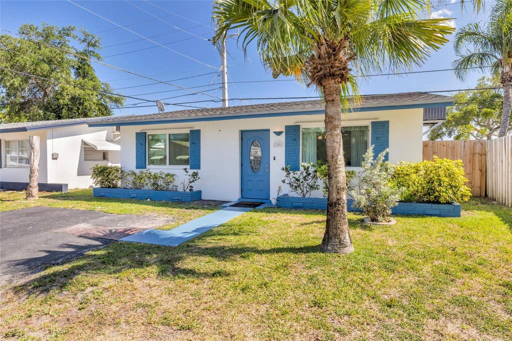 Photo of 1906 NW 45th Court, Tamarac, FL 33309 (MLS # B26040238)