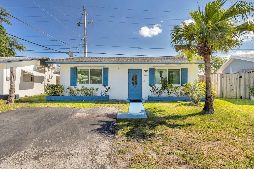 Photo of 1906 NW 45th Court, Tamarac, FL 33309 (MLS # B26040238)