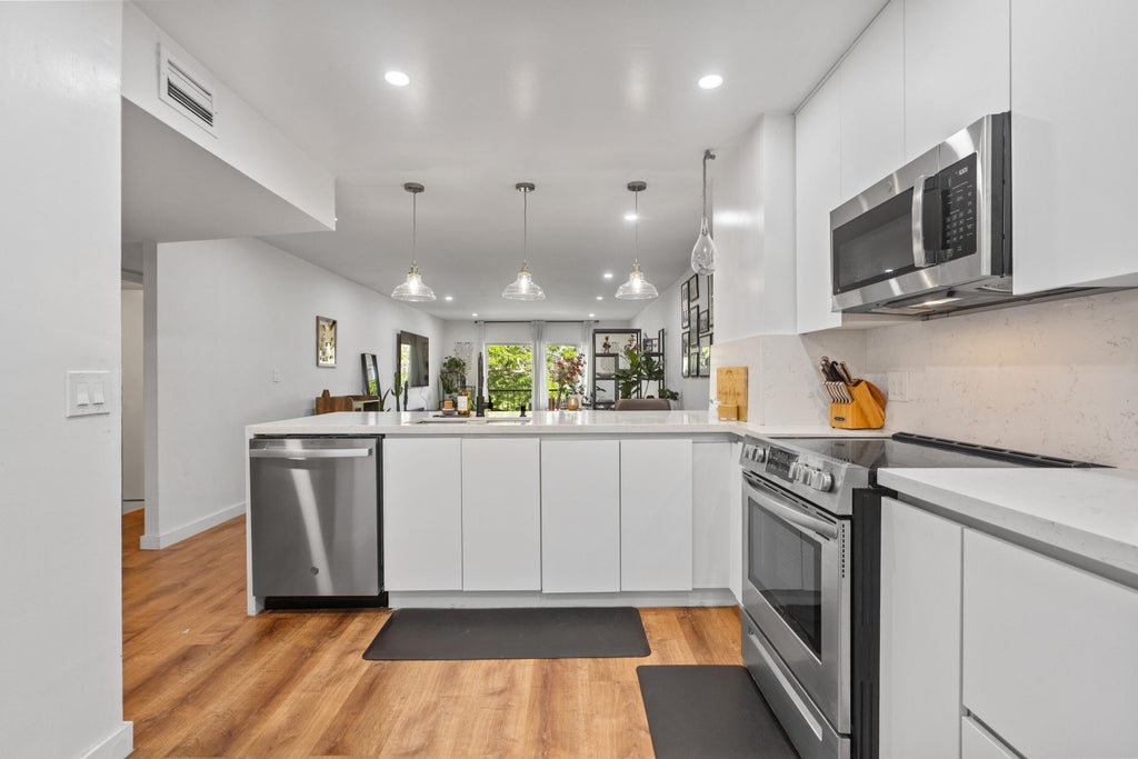 Photo of 6361 N Falls Cir Drive #305, Lauderhill, FL 33319 (MLS # B26051745)