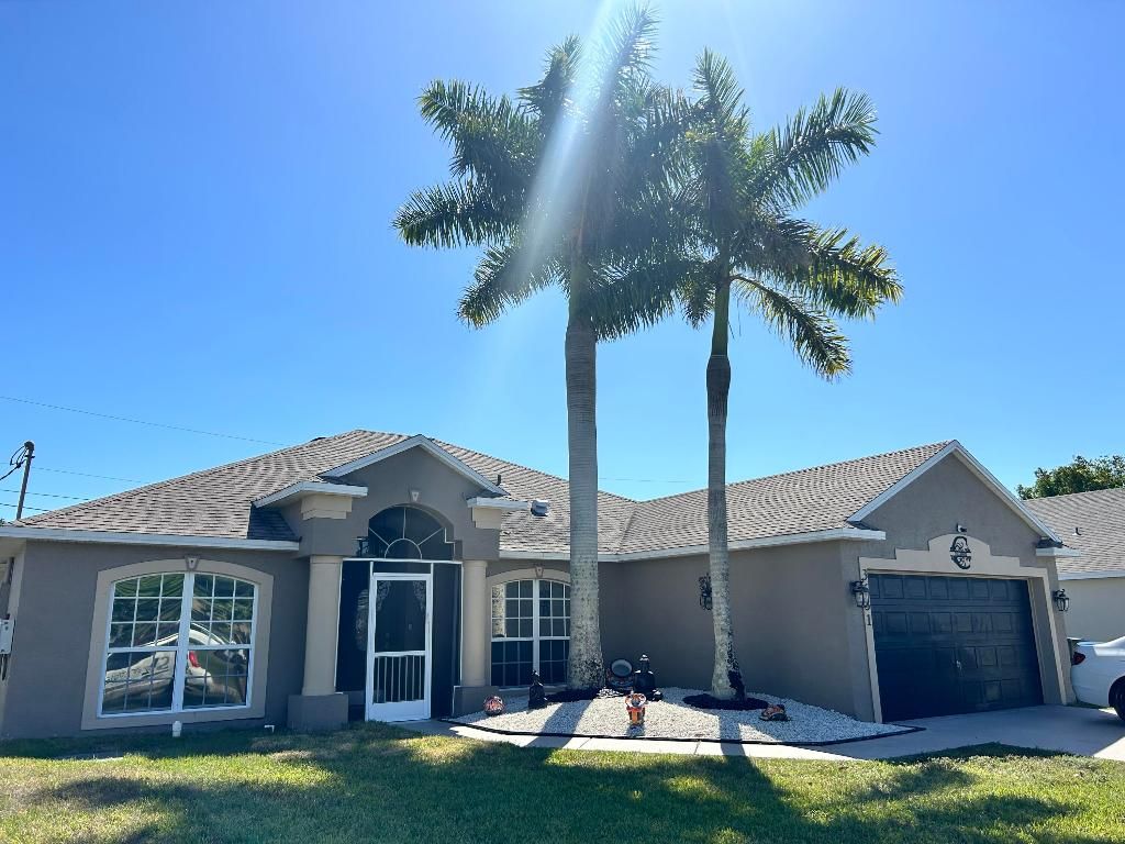 Photo of 3631 SW Haines Street, Port Saint Lucie, FL 34953 (MLS # R10977947)
