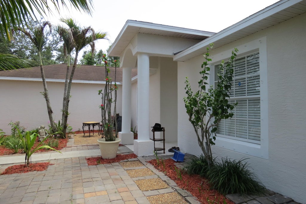 Photo of 2282 SW Savona Boulevard, Port Saint Lucie, FL 34953 (MLS # B26034713)