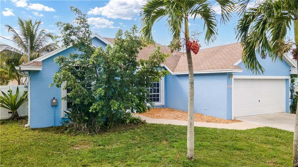 Photo of 2233 SE Heathwood, Port Saint Lucie, FL 34952 (MLS # F10312925)