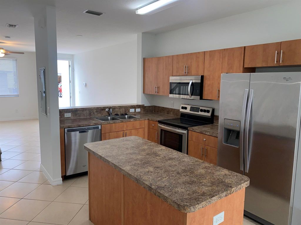 Photo of 3724 Oleander Terrace, Riviera Beach, FL 33404 (MLS # R10920771)