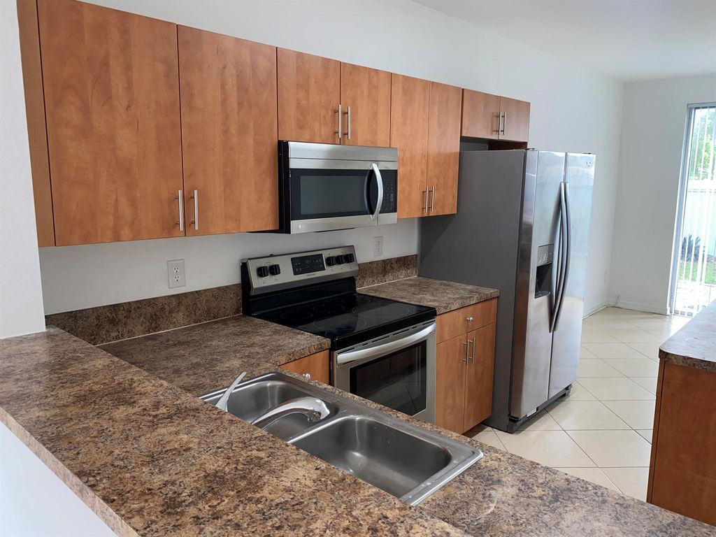 Photo of 3724 Oleander Terrace, Riviera Beach, FL 33404 (MLS # R10920771)