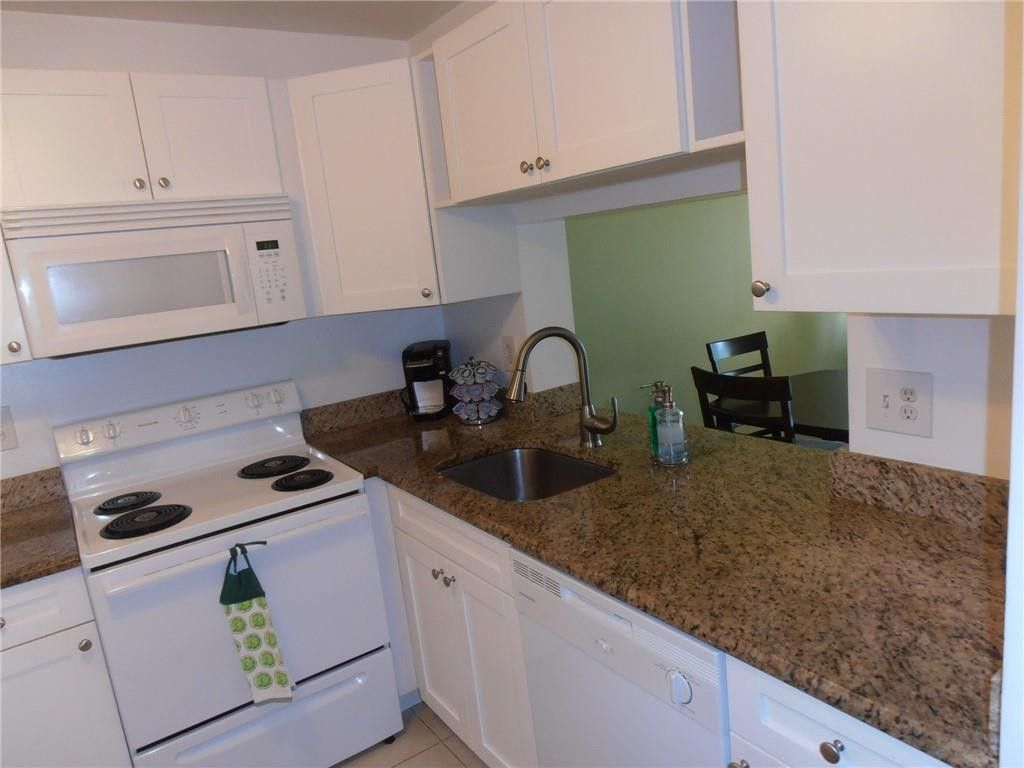Photo of 9460 Poinciana Place #101, Davie, FL 33324 (MLS # B26036551)