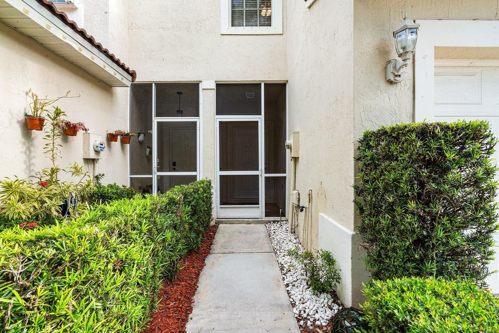 Photo of 9049 Tremezzo Lane, Boynton Beach, FL 33472 (MLS # B26023860)