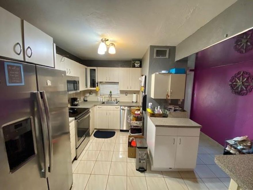 LIFESTYLE COUNTRY CLUB LIVING! BRIGHT CORNER 2BR/2BA. BEAUTIFUL PGA COURSE 18TH GREEN. WASHER/DRYER INSIDE. Impact windows including Slider and ENCLOSED PATIO. Master Bathroom updated. Kitchen ceiling raised. High-Hats bring lots of light in Lr/DR and Guest Bedroom. Tile flooring in living areas.  24 hr guard gated. Recreation Lease PAID IN FULL! FREE golf (except cart fees) on two 18 hole courses (PGA & Par3); WALK TO CLUBHOUSE. Recreation Lease PAID UP IN FULL! Amenities include Restaurant, Billiard Room, Bbq/Picnic Area, Clubhouse-Clubroom, Common Laundry, Courtesy Bus, Exercise Room, Heated Pool, Library, Putting Green, Sauna, Shuffleboard, Tennis, Pickle Ball, Vehicle Wash Area. NO MEMBERSHIP EQUITY! Close to shopping, dining and highways. 15 minutes to the beach. EXCELLENT!