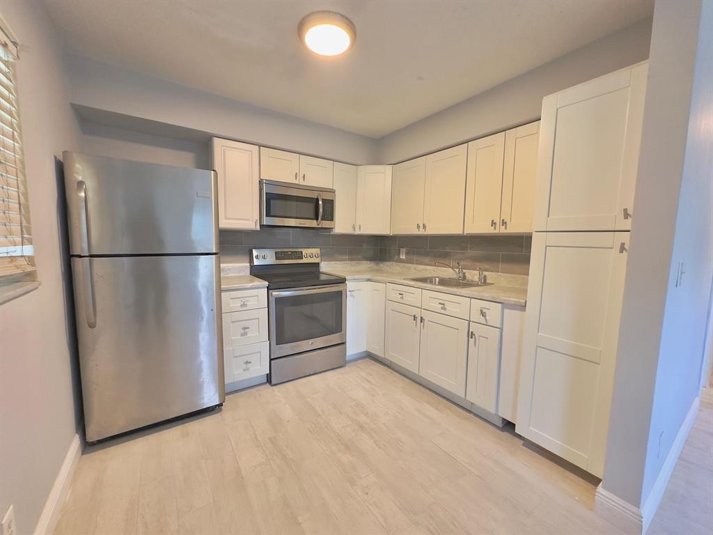 Photo of 1650 NW 52ND Avenue, Lauderhill, FL 33313 (MLS # B26081943)