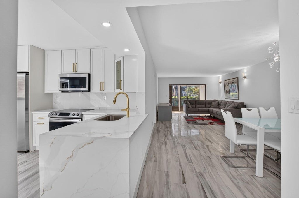 Photo of 15450 PEMBRIDGE Avenue #163, Delray Beach, FL 33484 (MLS # B26091371)