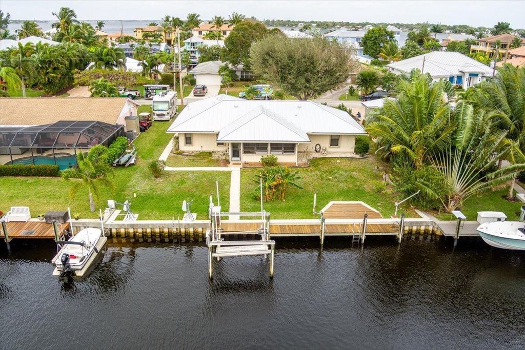 Photo of 1364 SW Egret Way, Palm City, FL 34990 (MLS # R10974956)