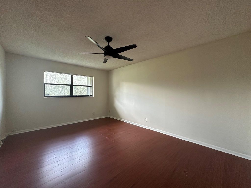 Photo of 22415 SW 61st Way #202, Boca Raton, FL 33428 (MLS # B26032771)