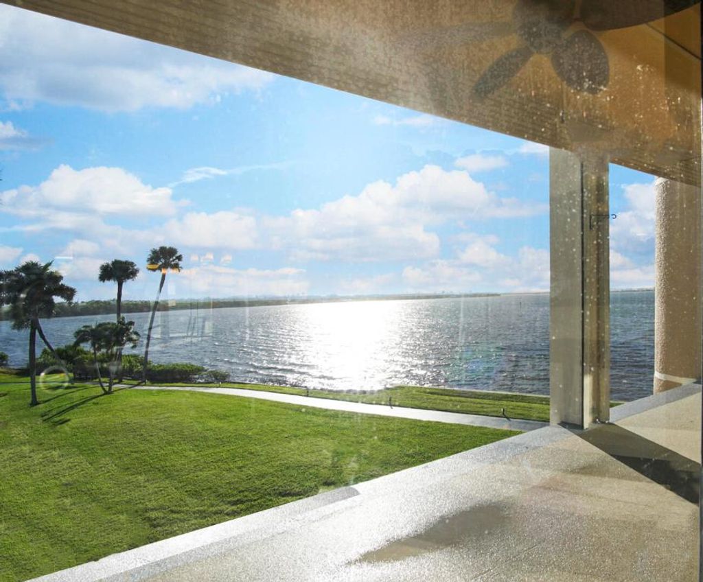 Photo of 3432 NE Causeway Boulevard #4-303, Jensen Beach, FL 34957 (MLS # R11136408)