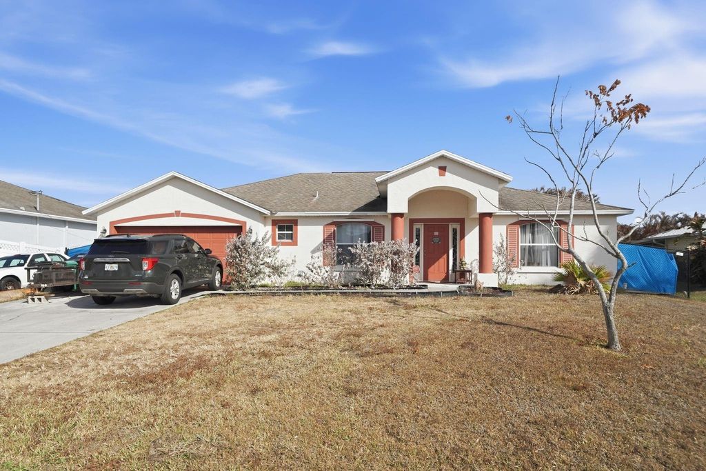 Photo of 721 NW Treemont Avenue, Port Saint Lucie, FL 34983 (MLS # F10554772)