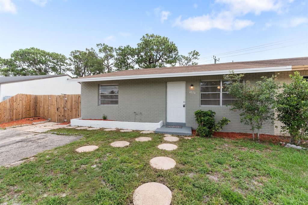 Photo of 4570 Empire Way, Greenacres, FL 33463 (MLS # R11092701)