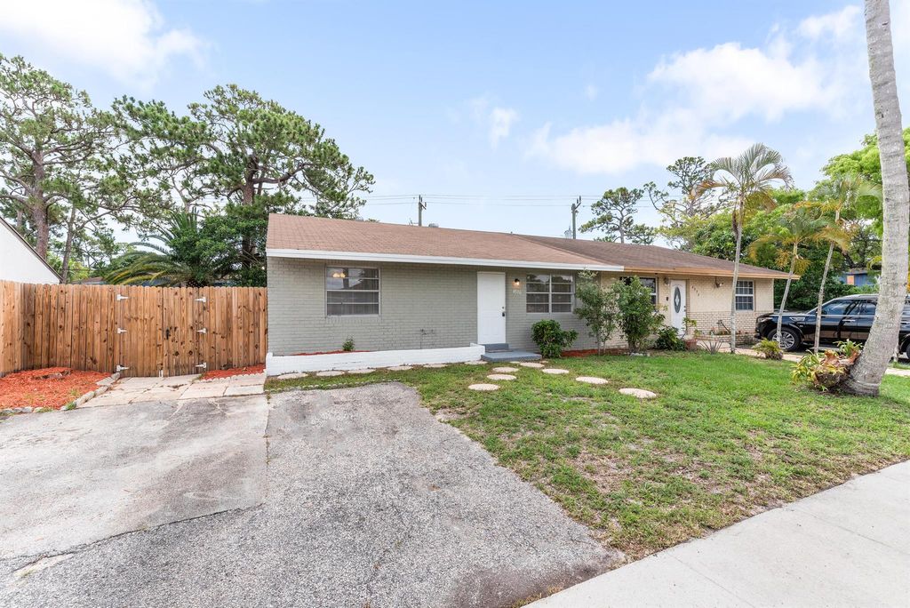 Photo of 4570 Empire Way, Greenacres, FL 33463 (MLS # R11092701)