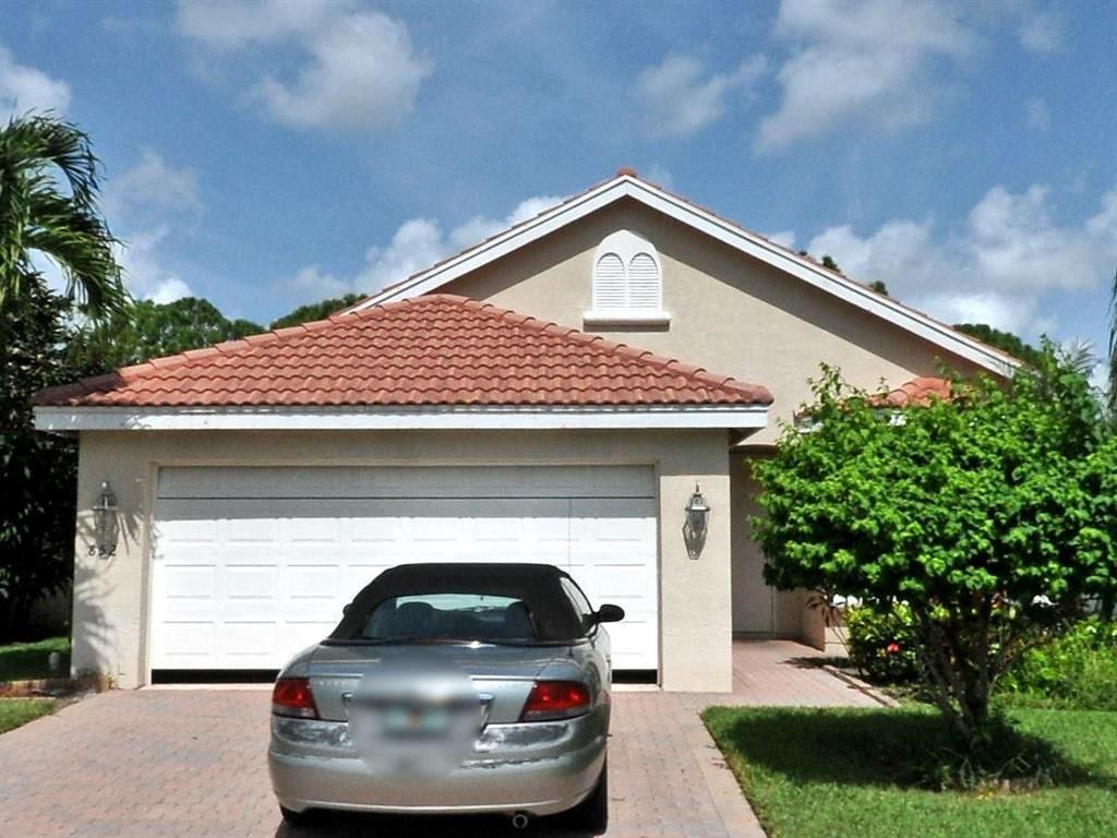 Photo of 852 SW Munjack Circle, Port Saint Lucie, FL 34986 (MLS # R10735226)