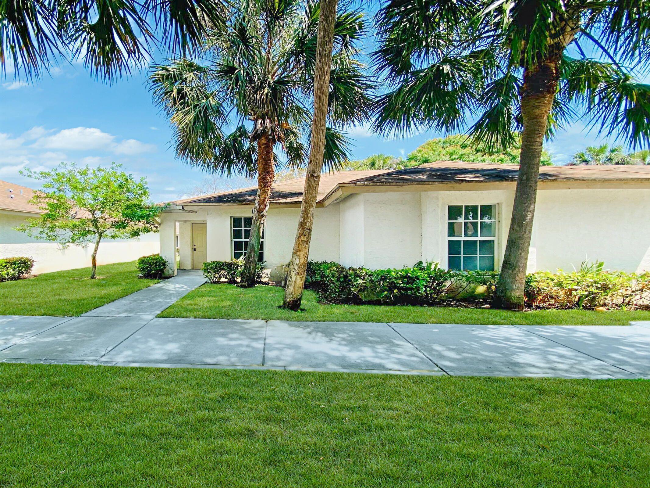 COMPLETELY RENOVATED beautiful 3 bedroom 2 bathroom villa with brand new modern kitchen, new stainless steel appliances, washer/dryer, big open floor plan with vaulted ceiling, sliding glass doors to your covered porch, inside private laundry, new countertops, new light fixtures, all new plumbing fixtures. 1401 sq ft, electric range/oven, new fridge, NEW flooring thru-out, no carpet at all,Tenant pays all utilities, owner pays lawn. $145 transaction fee. Located in private community with no HOA, easy application process can be done online. $85/month pest and trash fee additional., $2735/month total rent