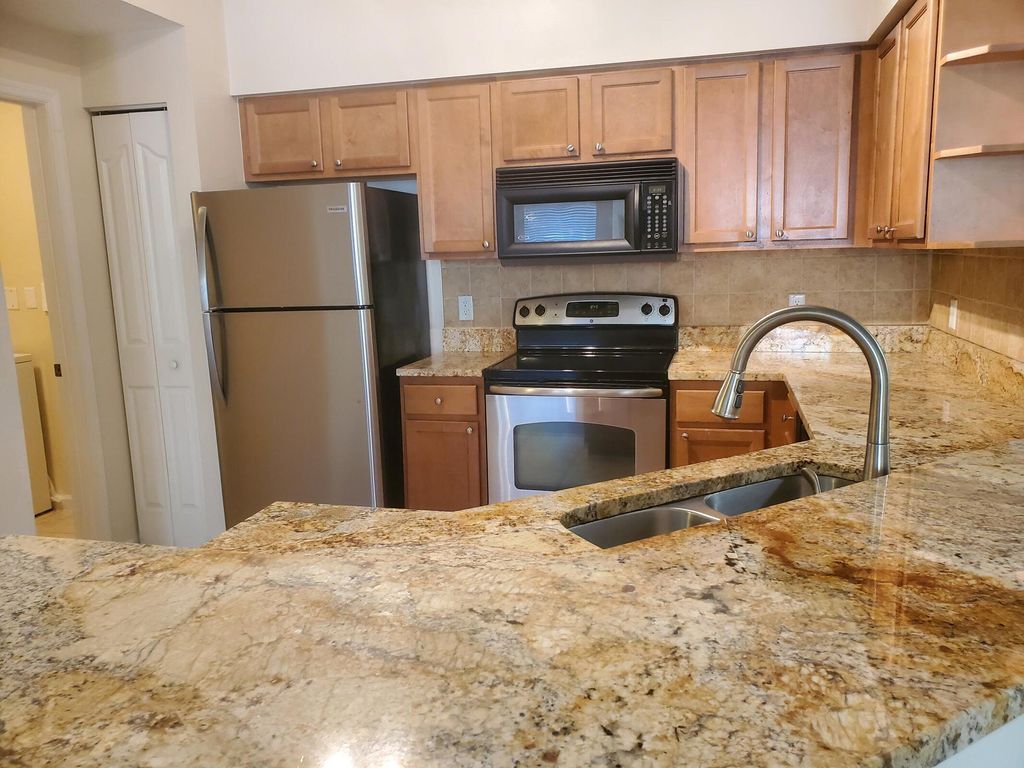 Photo of 9203 W Mytrlewood Circle W #9203, Palm Beach Gardens, FL 33418 (MLS # R11164750)