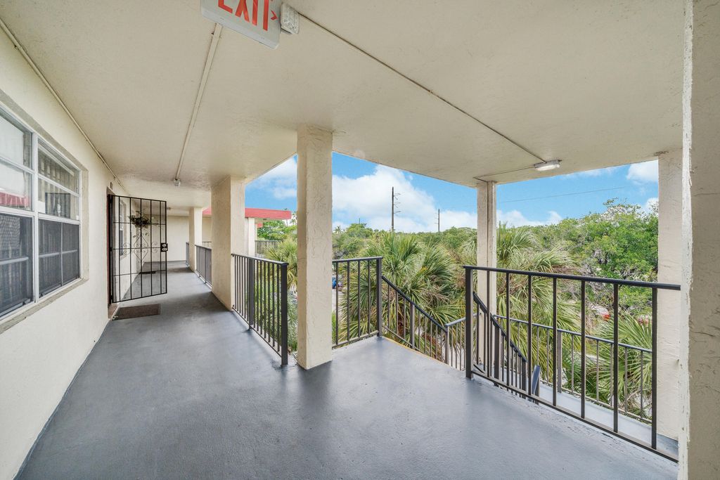 Photo of 3070 NW 48th Terrace #405, Lauderdale Lakes, FL 33313 (MLS # B26038589)