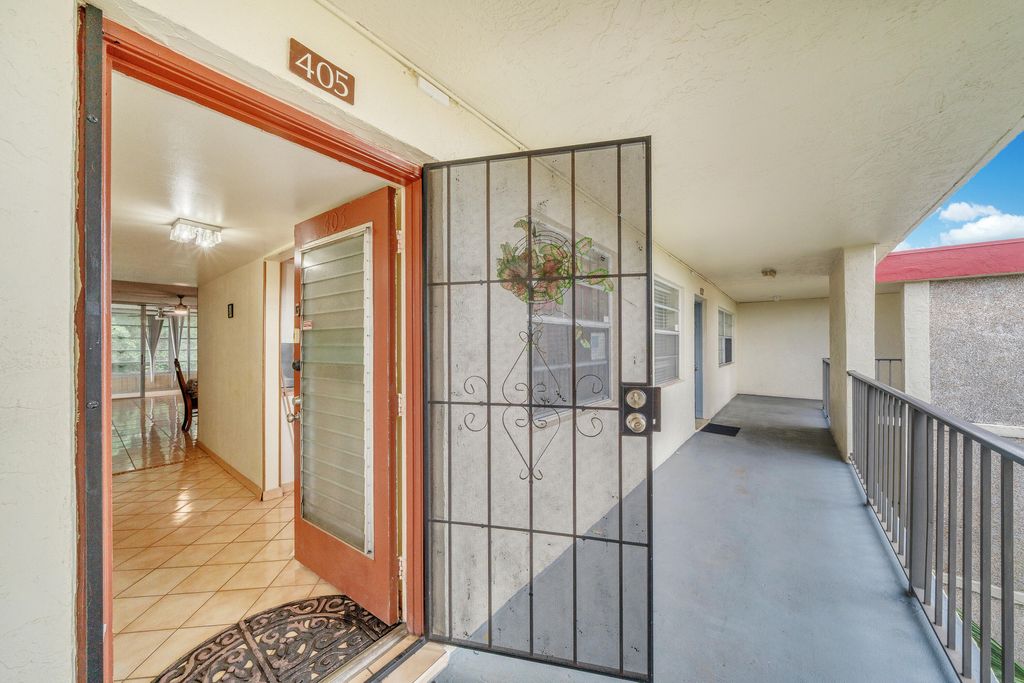 Photo of 3070 NW 48th Terrace #405, Lauderdale Lakes, FL 33313 (MLS # B26038589)