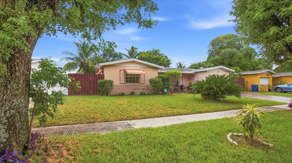 Photo of 4460 NW 24TH Street, Lauderhill, FL 33313 (MLS # B26083030)