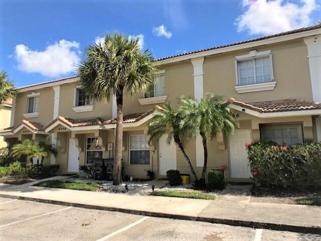 Photo of 6948 Stoney Creek Circle Cir, Lake Worth Beach, FL 33467 (MLS # R10809262)